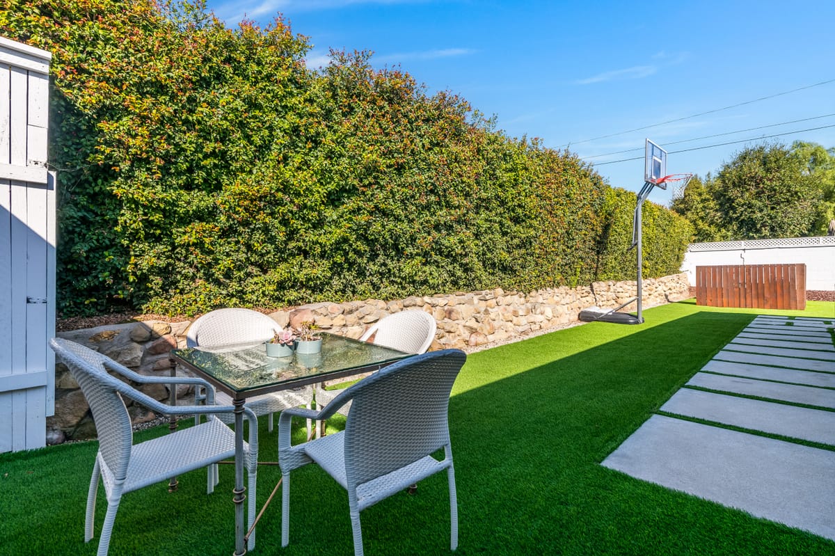 Rear yard with turf and hedging